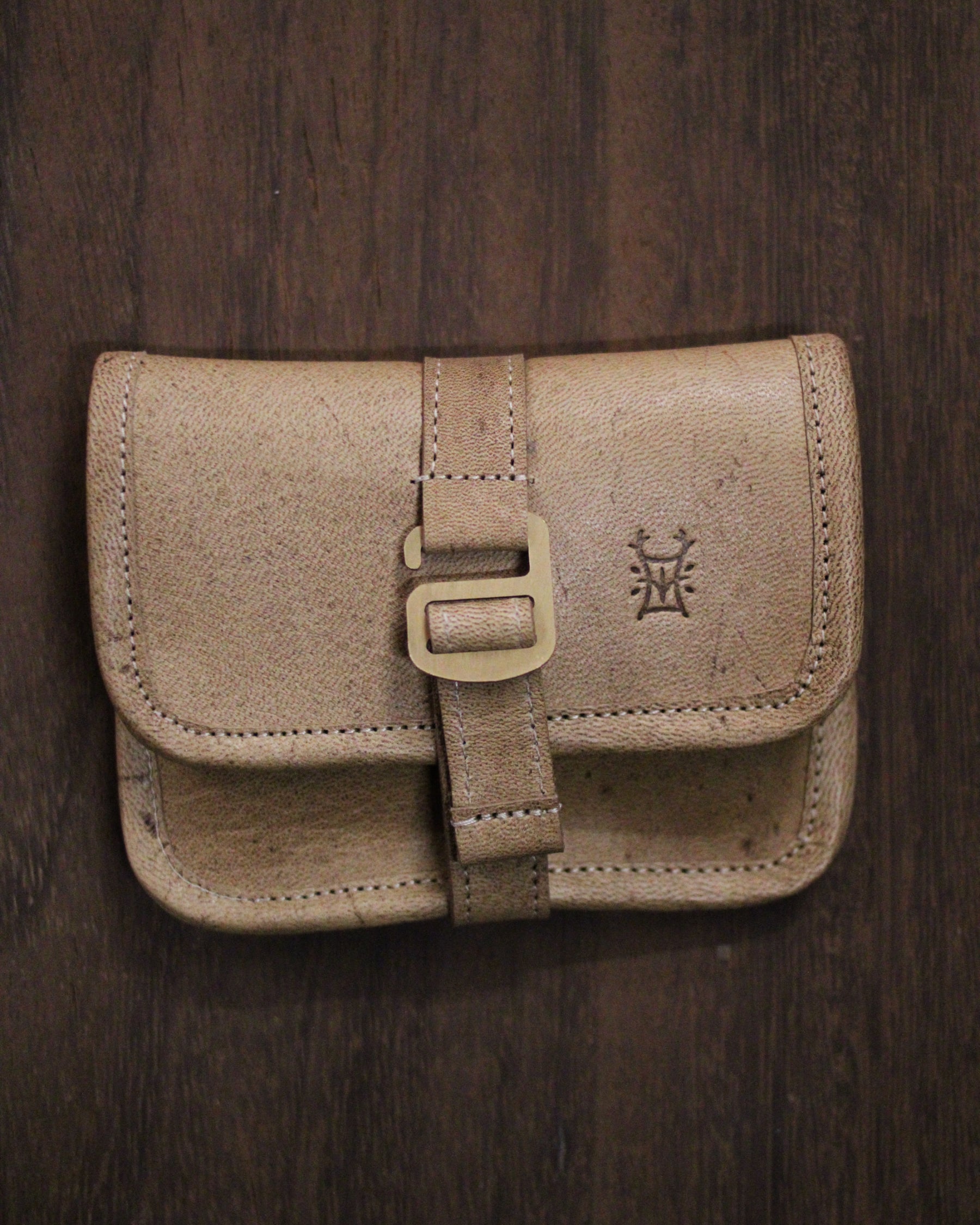 Bay Tine Tannery ammunition pouch with acorn design, featuring durable leather construction and compact storage for ammo.
