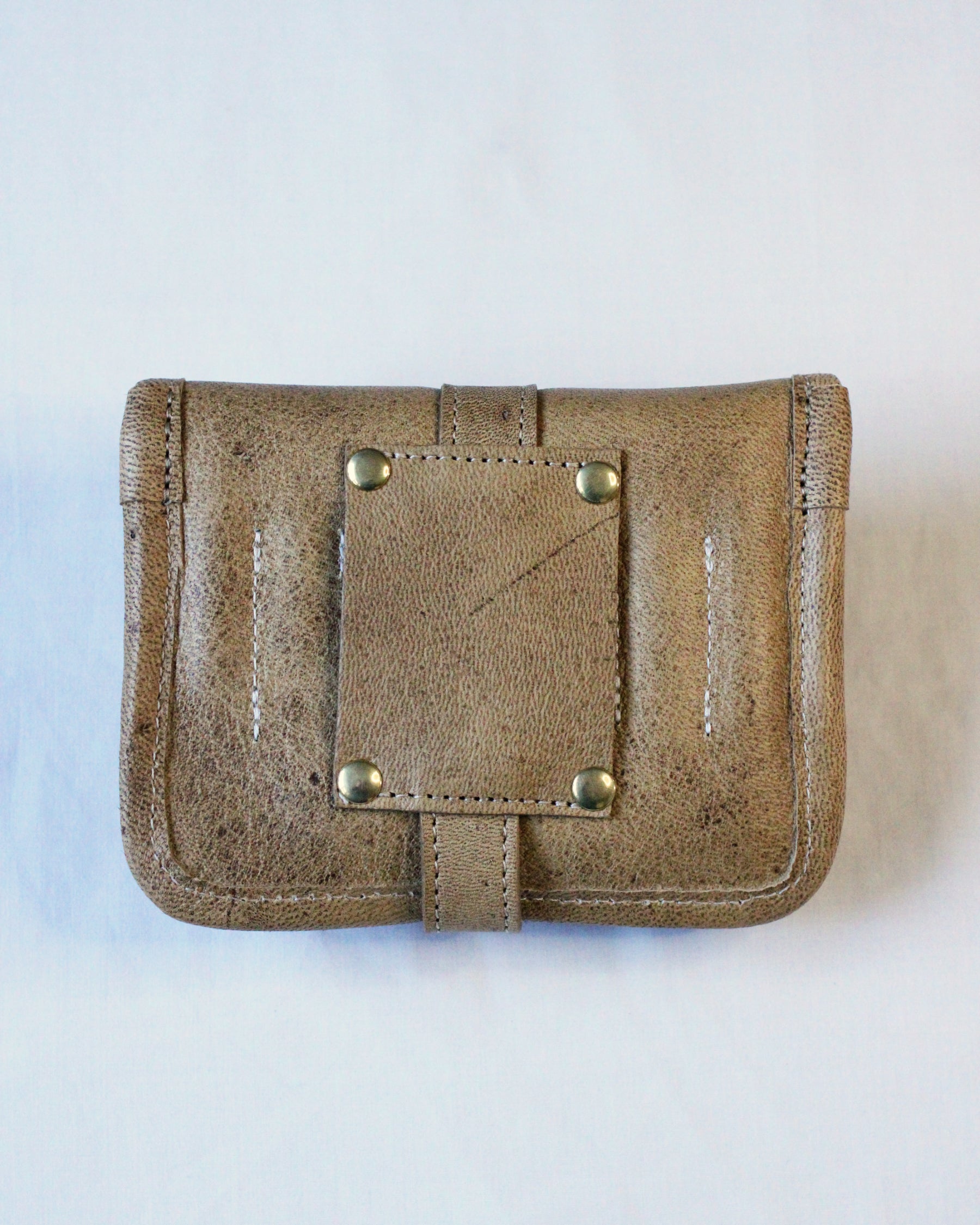 Bay Tine Tannery ammunition pouch with Acorn design, featuring durable leather and secure closure for firearm accessories.