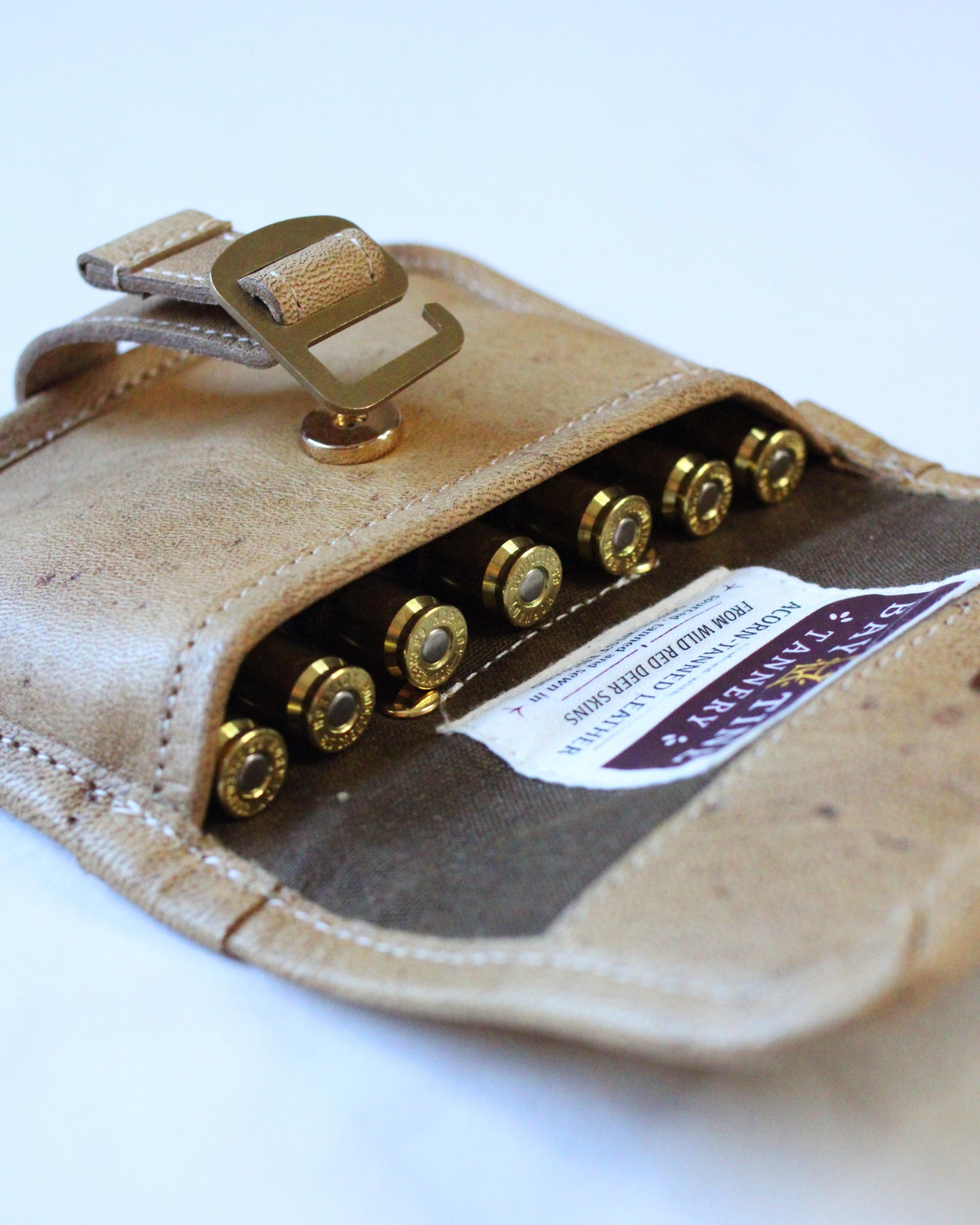 Bay Tine Tannery ammunition pouch in Acorn leather, featuring a compact design and secure closure for firearm ammunition storage.