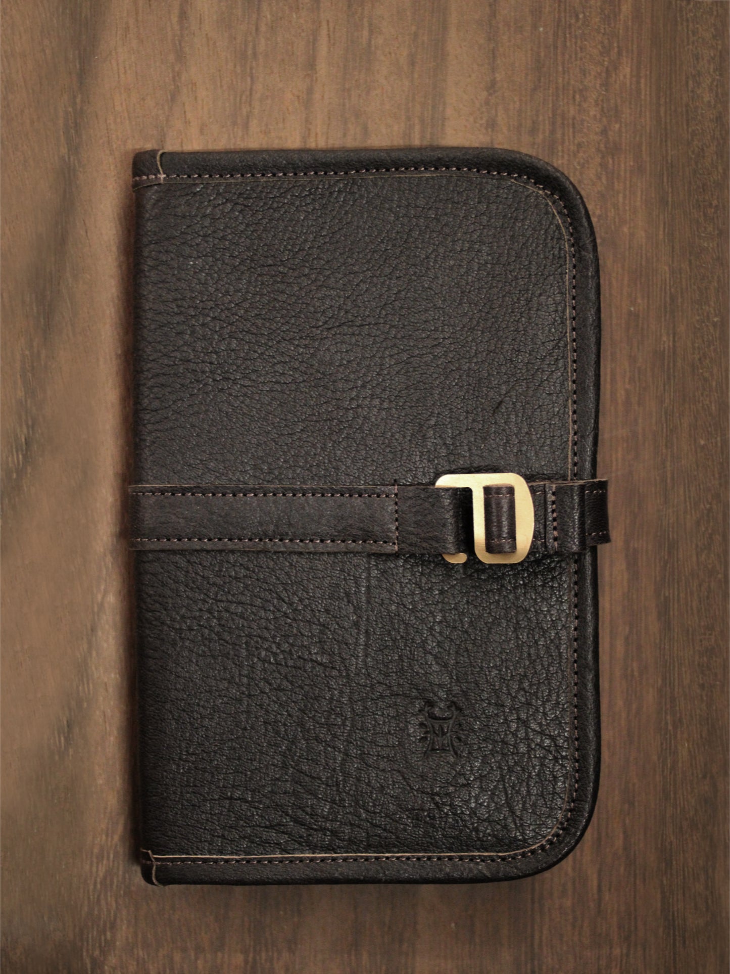 Brown leather journal cover by Bay Tine Tannery featuring Dartmoor design, with visible stitching and textured leather surface.