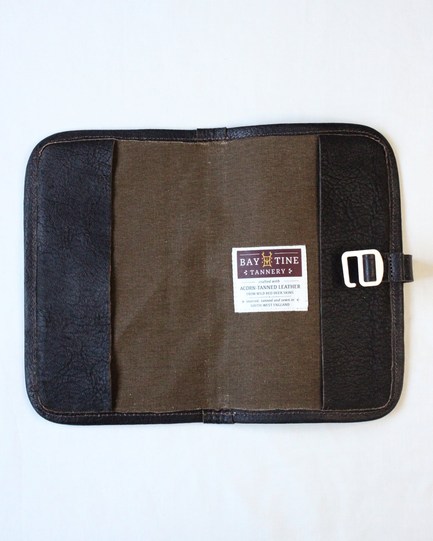 Leather journal cover by Bay Tine Tannery featuring the Dartmoor design, with textured brown leather and sturdy stitching.