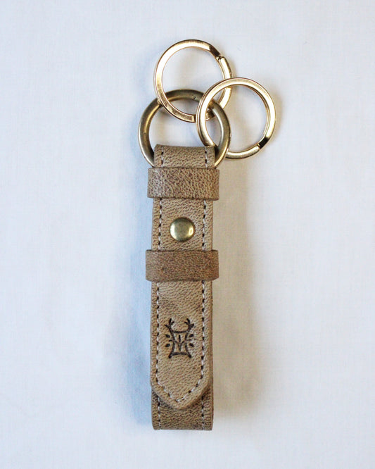 Bay Tine Tannery Acorn key fob with detailed leather craftsmanship and metal key ring, designed for key organization and style.