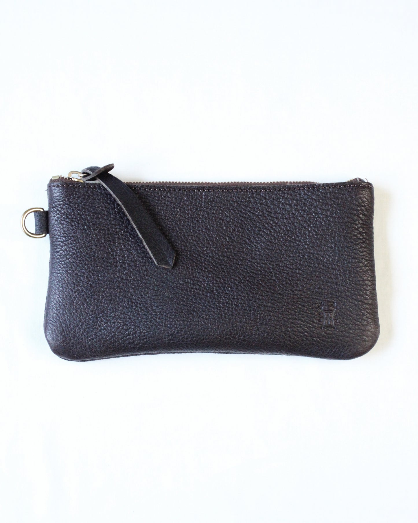 Black leather zip pouch with Dartmoor design by Bay Tine Tannery, featuring a compact and stylish storage accessory.